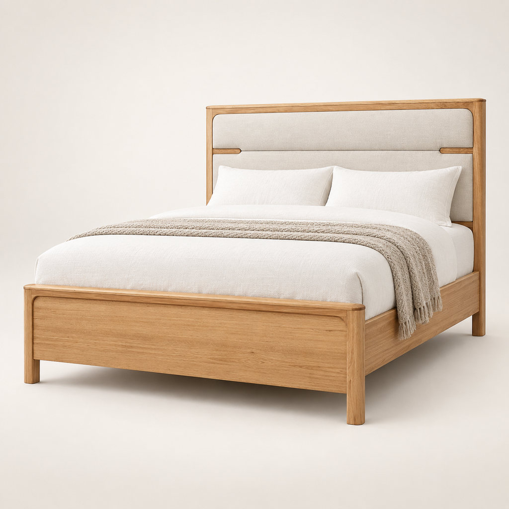 A modern wooden bed frame with a light beige upholstered headboard, styled with white bedding and a textured beige throw blanket, set against a plain off-white background.