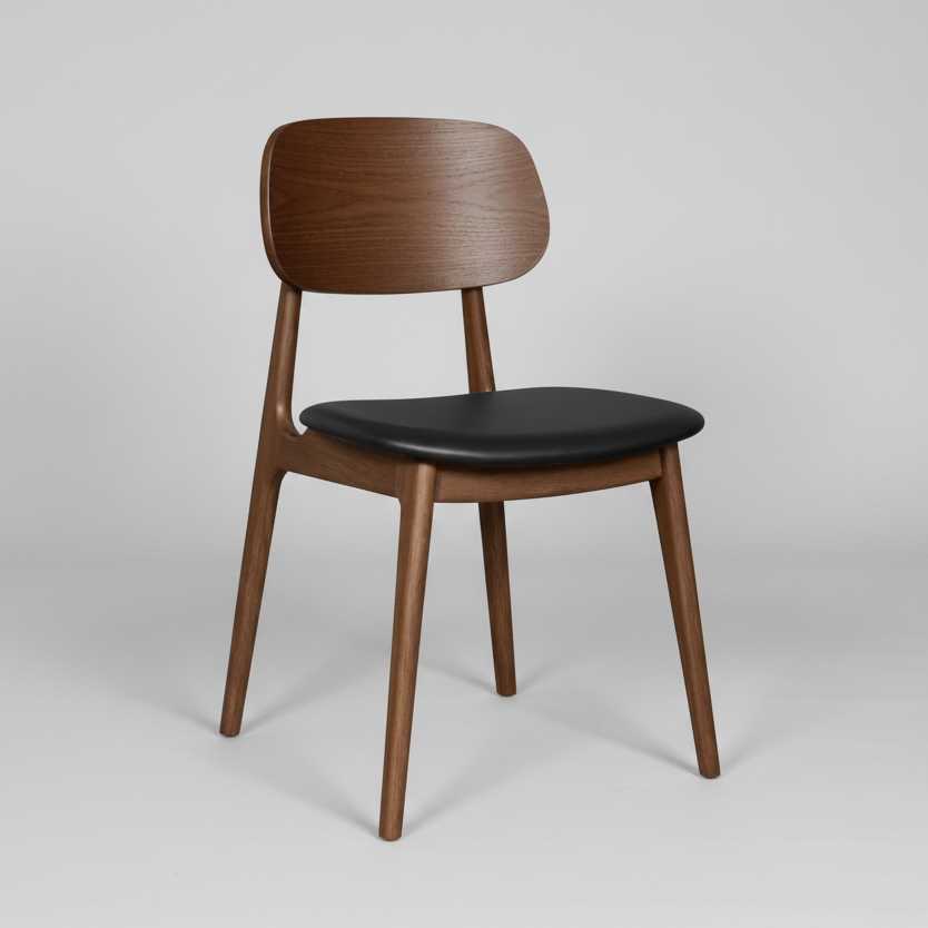 Wooden chair with black seat on a gray background