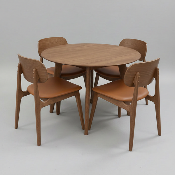 Wooden dining table with four matching chairs on a gray background