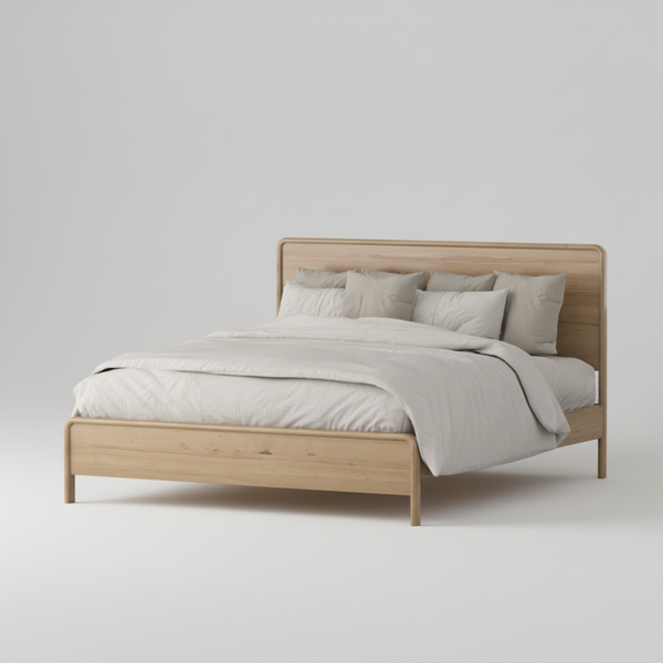 A light oak wood platform bed with a tall rectangular headboard and matching footboard, styled with light gray bedding and pillows, shown on a white background with the text 'BED MAXWELL Bedroom Range' in the top-left corner.