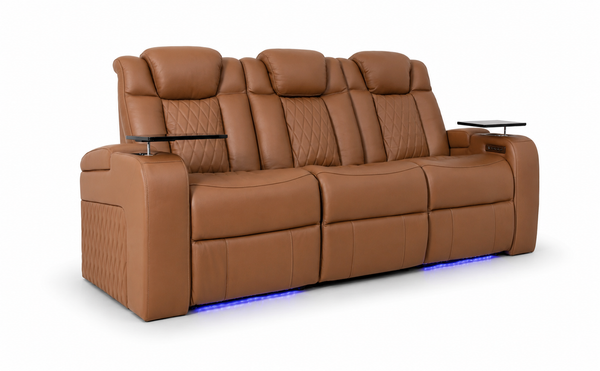Tan electric recliner sofa with padded headrests and tufted back cushions