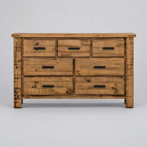 A rustic wooden dresser with six drawers and dark metal pull handles, shown against a plain white background.