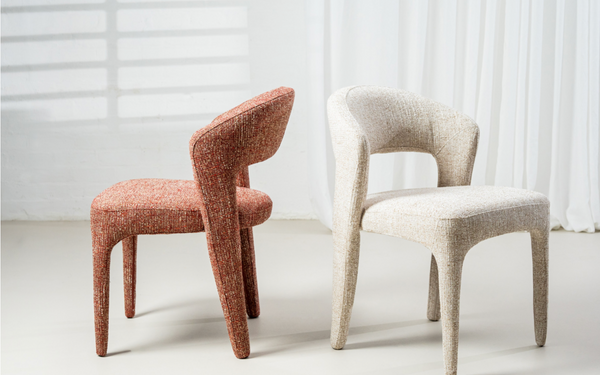Pair of dining chairs: rust-orange and light beige upholstered with curved backs
