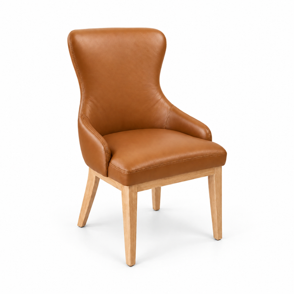 A modern high-back dining chair upholstered in warm cognac brown faux leather with light natural wood legs, shown on a clean white background.
