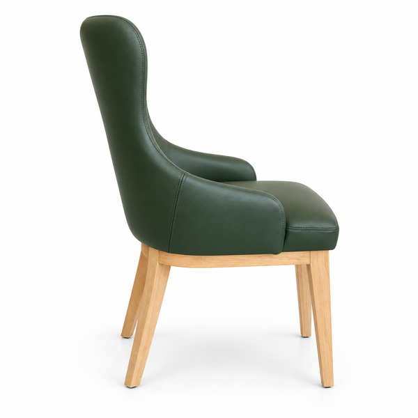 A modern dining chair with a tall, curved back upholstered in dark forest green leather, supported by light natural wood legs, shown from a side profile on a white background.