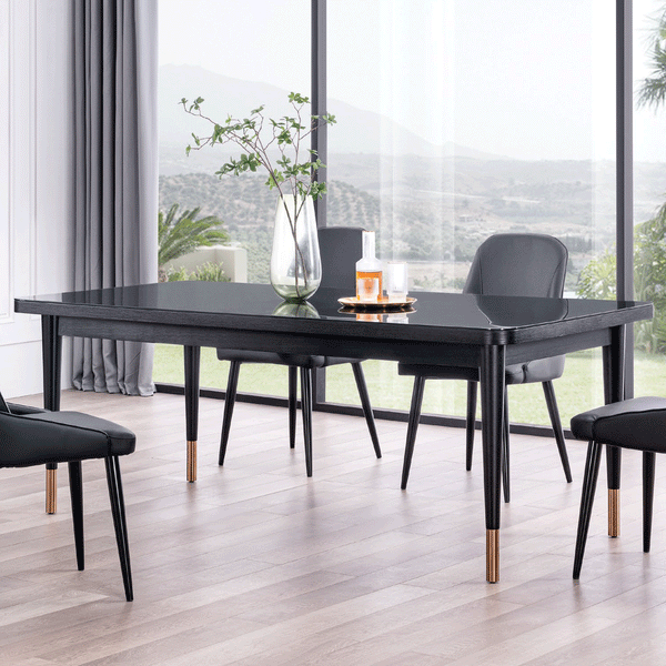 Anastasia Dining Table features a Black Glass Top with Black Woodgrain and Rose Gold Accents